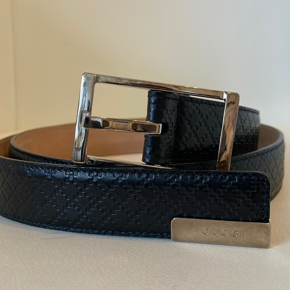 Gucci men’s belt.  Gucci 38.  Great condition.  Silver buckle.  Fits a size 34